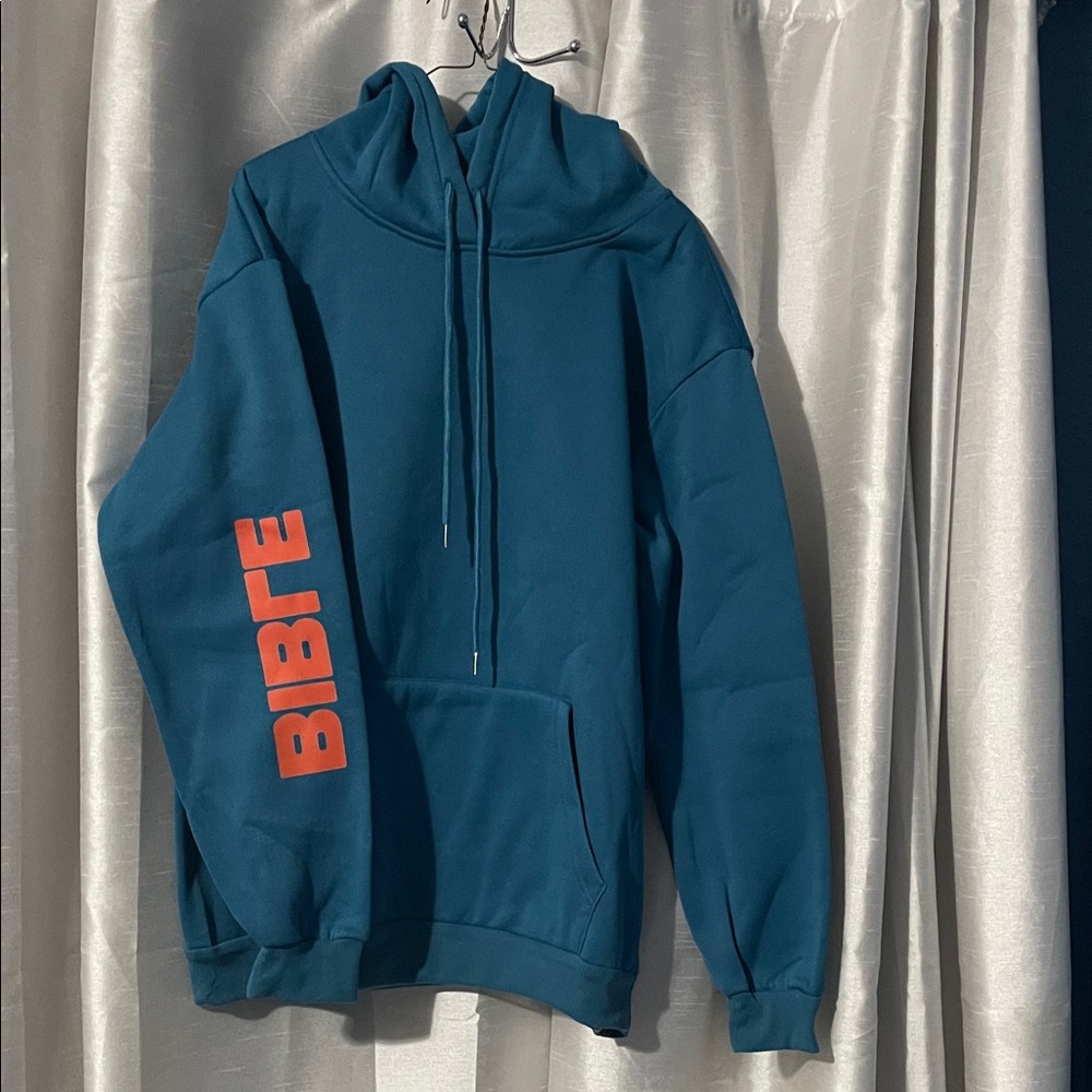 Blue Hoodie with Orange Bible Print